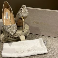 Only Worn Once! Basically Brand New Jimmy Choo White, Gold, Silver Infinity Glitter Fabric Heels. Gorgeous Sparkle To Them. Comes With Original Box Elegant Heels With Glitter Accents And Round Toe, Luxury Sequined Heels For Wedding, Designer Sparkling High Heels, Luxury Sequined High Heels, Elegant Closed-toe Shimmer Heels, Luxury Glitter Accented Heels For Gala, Elegant Shimmer Closed Toe Heels, Luxury Glitter Heels For Cocktail, Luxury Glitter Heels For Event