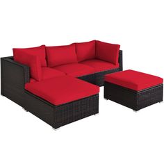 an outdoor furniture set with red cushions