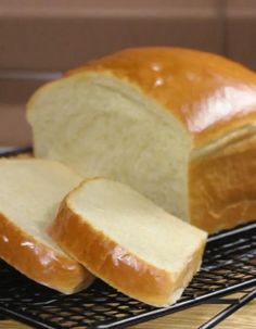 a loaf of bread sitting on top of a cooling rack