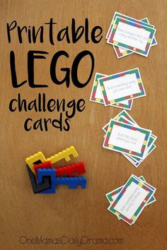 the printable lego challenge cards are laid out on a wooden table with black lettering