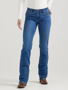 RIDING JEANS THAT NEVER QUIT Feel confident and comfortable in your riding clothes by giving yourself the best seat possible. Wrangler® women's Ultimate Riding Jeans are designed for fit, form, and function while on horseback, but they are bound to become your go-to jeans for working in the barn and running errands around town. Q-Baby women's jeans feature a mid-rise fit and no-gap waistband for full coverage when you're in the saddle as well as added stretch and flat seams for all-day comfort. Wrangler Women, Riding Jeans, Riding Clothes, Never Quit, Womens Jeans Bootcut, Baby Jeans, On Horseback, Riding Outfit, Wrangler Jeans