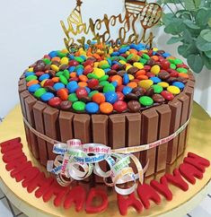 a birthday cake decorated with candy and candies