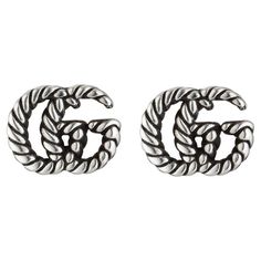 Gucci Double G Motif Aged Sterling Silver Stud Earrings YBD627755001 The House's emblematic monogram appears in a twisted, torchon design on these sterling silver earrings. Expertly made and intricately designed, often with subtle nods to the House, Gucci's silver jewellery collection is presented in an array of contemporary and classic pieces. Size 12mm. This item will arrive beautifully packaged in a unique Gucci presentation box. Gucci Jewellery, Gucci Earrings, Gold Diamond Hoop Earrings, Gucci Style, Gold Topaz, Gucci Jewelry, Gucci Gg Marmont, Round Necklace, Sterling Silver Stud Earrings