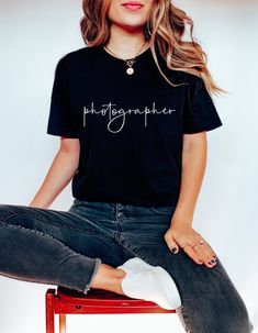 Looking for the perfect gift for a photographer? Look no further than our photographer shirt! This unique and stylish shirt is perfect for any photography lover out there. Not only is it a great way to show your support, but it also makes a great gift for anyone who loves taking pictures. Whether you're a wedding photographer or just someone who enjoys shooting photos with their camera, this shirt is sure to make a statement. So why not get yourself a copy today? H O W - T O - O R D E R  - Be sure to review the size chart in the photos before making your selection. - Select the size and color you want from the drop-down menus. - Click the "Add to Cart" button, then proceed to check out once you have added all of your items. M A T E R I A L S Solid Colors are 100% Ring-Spun Cotton, Heather Product Photography Tshirts, Student Photography, Gift For Photographer, Photographer Outfit, T-shirt Photography, Tshirt Photography, Art Tshirt, Photography Student, Camera Art