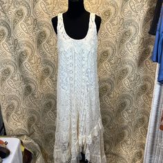 Nwot ~ Gorgeous Sundance Lace Dress In Ivory With An Asymmetrical Hemline > Slip Included. Perfect Dress For Summer Outing ~ Bust ~ 34” ( Slip As Well) Length ~ 54” At The Longest Point Long Summer Dresses With Lace Trim, Fitted Lace Maxi Sundress, Sleeveless Lace Festival Dress, Sleeveless Lace Dress For Festival, Festival Sleeveless Lace Dress, Off White Sleeveless Maxi Dress With Lace Trim, Festival Sleeveless Fitted Midi Dress, Fitted Sleeveless Midi Dress For Festival, Flowy Sleeveless Lace Midi Dress