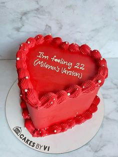 a red heart shaped cake with the words i'm feeling 22 valentine's version written on it