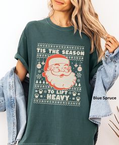 Comfort Colors Tis The Season To Lift Heavy Tshirt -UNISEX Comfort Colors C1717 T-SHIRTS -100% ring-spun cotton - Preshrunk, soft-washed, garment-dyed fabric -Set-in sleeves -Double-needle stitched sleeves and bottom hem -Twill taped shoulder-to-shoulder -1" ribbed collar with double-needle topstitched neckline Please order 1 or 2 sizes up for an oversized look. These ultra soft pigment dyed shirts are one of our best sellers! Please use the provided sizing chart when selecting a size, when in doubt- SIZE UP! I DO NOT ACCEPT EXCHANGES OR RETURNS: all items are made to order. PROCESSING AND SHIPPING 3-5 business days for processing Allow 1-7 business days for shipping CARE INSTRUCTIONS Wash inside out with similar colors Tumble dry low or hang to dry Try not to iron *How to Place an Order* Holiday Crew Neck Pre-shrunk Top, Christmas Letter Print Crew Neck Tops, Holiday Graphic Tee With Crew Neck, Holiday Winter Graphic Tee, Christmas Gym, Gym Pump Cover, Gym Pump, Pump Cover, Holiday Vibes