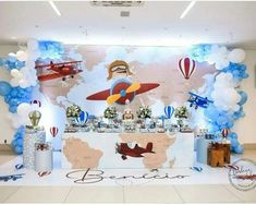 an airplane themed birthday party with balloons and decorations