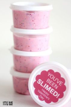 there are five cups with pink and white frosting on them that say you've been slimmed