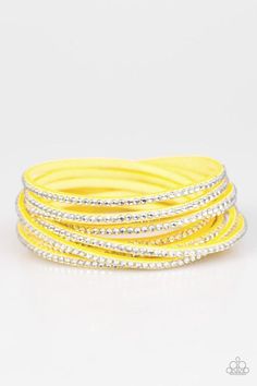 Yellow suede is spliced into six strands and embellished with rows of white rhinestones for a glitzy combination. The elongated suede band allows for a trendy double wrap design. Features an adjustable snap closure. Sold as one individual bracelet. P9DI-URYW-011XX Yellow Bracelet, Double Wrap Bracelet, The Hustle, Paparazzi Accessories, White Rhinestone, Paparazzi Jewelry, Trendy Jewelry, Jewelry Party, Wrap Bracelet