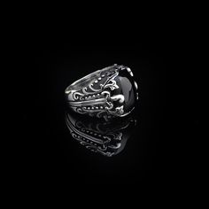 Onyx Warrior, Sterling Silver Sword Ring with Black Onyx Stone , Onyx Sword Sterling Silver Ring with Black Onyx Gemstone  This ring is produced in high quality and offered to serve our valued customers. Our products are produced as 925K silver and sent to our products in stamped form. We design and produce beautiful jewelry for you and your loved ones. Our products are suitable for daily use. Coatings and mines are manufactured in such a way that they do not pose any health problems. All of our Gothic Black Skull Ring, Adjustable Black Skull Ring, Gothic Engraved Black Jewelry, Gothic Black Engraved Jewelry, Black Onyx Gothic Rings, Gothic Black Ring With Polished Finish, Black Gothic Ring With Polished Finish, Gothic Black Onyx Rings, Black Onyx Stone