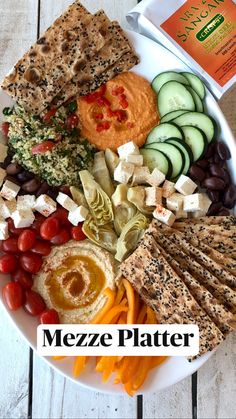 a white plate topped with lots of different types of food