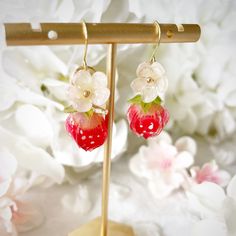 Indulge your sense of whimsy and style with these delightful Handmade Shrink Plastic Strawberry Earrings. Crafted with love and attention to detail, these earrings are a perfect blend of playfulness and elegance. 🍓 Artistry in Every Detail: Each strawberry charm is meticulously handcrafted from shrink plastic, giving it a unique and charming character. The vibrant red hue captures the essence of ripe strawberries, while tiny green leaves add a touch of authenticity. 🍓 Lightweight and Comfortab Sweet Strawberry Print Jewelry As Gift, Gold Earrings With Fruit Design For Gift, Berry Colored Fruit Design Earrings For Gift, Berry-colored Fruit Design Earrings For Gift, Pink Strawberry Print Earrings For Gift, Pink Strawberry Print Earrings As Gift, Cute Strawberry Print Earrings For Gifts, Handmade Gold Sweet Jewelry, Sweet Gold Earrings For Gift