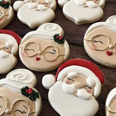 decorated cookies with santa's face and glasses on them