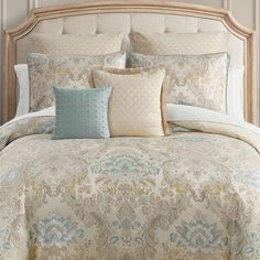 the comforter is neatly made and ready to be used in this bedding set