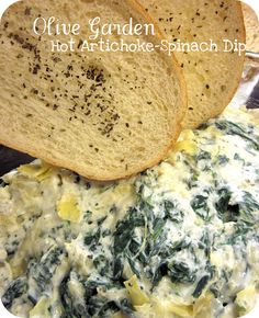 some bread and spinach are on a plate