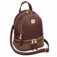 Small in size…big in style!This charming backpack is crafted of rich chestnut brown faux leather with gold-tone hardware and a stylish riveted pattern along the base.No detail goes unnoticed in this true performance piece. It’s loaded with dual-access zippered pockets, multiple exterior pockets as well as interior zip and slip pockets.Wear this lightweight and sturdy backpack using both its adjustable shoulder straps, as a shoulder bag or crossbody, or carry it by the classic top loop. As an add Brown Leather Bag With Metal Zipper, Brown Leather Bags With Rivets, Chic Brown Backpack With Zipper Closure, Brown Leather Backpack With Gold-tone Hardware, Brown Backpack With Gold-tone Hardware For Travel, Morganite Jewelry, Murano Glass Jewelry, Satchel Backpack, Peridot Jewelry