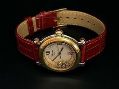 Elegant Red Diamond Watch For Gift, Elegant Gold Watch For Valentine's Day, Formal Red Jewelry With Diamond Hour Markers, Luxury Round Jewelry And Watches For Gift, Formal Round Analog Diamond Watch, Diamond Watch With Rotating Bezel, Round Dial For Gift, Diamond Watch With Rotating Bezel As Gift, Elegant Red Diamond Watch For Formal Occasions, Red Band