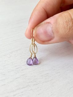 Amethyst Earrings, February Birthstone, Dainty Purple Drop Earrings, Simple Amethyst Jewelry, Gold or Silver, Purple Earrings, Gift for her These dainty, delicate drops are classic earrings with a Modern Twist, they feature 5mm Amethyst drops wire wrapped to an oval twisted link in gold filled or sterling silver. The earrings are suspended from ear wires in the finish of your choice. These are Simple, light weight earring you'll find yourself wearing almost daily. Ideal versatile gift for mother Delicate Dangle Earrings With Birthstone, Gold Amethyst Dainty Earrings, Purple Dainty Earrings With Ear Wire, Dainty Purple Earrings With Ear Wire, Lavender Teardrop Jewelry With Ear Wire, Everyday Purple Jewelry With Ear Wire, Purple Amethyst Birthstone Earrings, Dainty Gold Amethyst Earrings, Everyday Purple Dangle Earrings