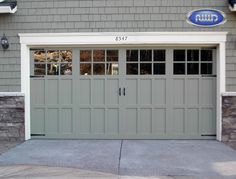 an image of a garage door with windows