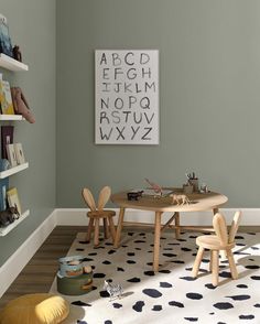 a child's playroom with toys and books