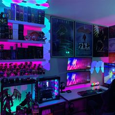 a room filled with computer monitors and gaming accessories