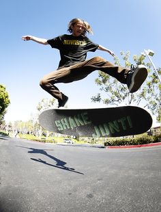 a skateboarder is doing a trick in the air