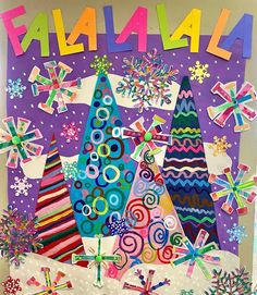 an art project with colorful paper decorations and words on the front, above it is a christmas tree surrounded by snowflakes