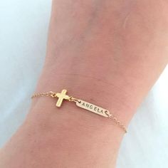 Personalised Dainty Cross Bracelet, Baby Baptism Jewelry, Christening Gift, Gift for Goddaughter, First Communion Gift, Custom Name Jewelry♥ Available in silver, gold and rose gold.♥ Please be sure to leave a name ( max. 8 letters ) OR date in the note box at checkout.Please note for date's year it will be shorten, ie. 2018 to 18.♥ Specification. Bar size 16 x 3.2mm is Sterling Silver or 14K Gold Filled or 14K Rose Gold Filled. Cross size 6 x 10mm is silver plated or gold plated or rose gold pla Silver Name Jewelry For Baptism, Spiritual Silver Bracelet For Baptism, Personalized Gold Name Bracelet For Baptism, Baptism Bracelet Girl, Personalized Cross Rosary Bracelet For Baptism, Adjustable Cross Bracelets For Baptism, Personalized Silver Name Bracelet For Baptism, Sterling Silver Heart Bracelet, First Communion Gifts