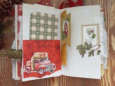 an open christmas card book on a wooden table