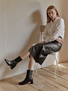 Editor's NotesFLORIDA STUDIO will add uniqueness to simplicity- Light-weighted slim square toe- Ankle boots for unique silhouette- Set on a stacked heel for the point - Soft and durable leather texture- Casual and minimal styleMeasurements(in.)- Size: KR 230MM (US 6) ~ KR 250MM (US 8)- Heel Height: 2.0in.*Fits true to size.Composition & Care- Composition leather- Avoid direct heat and moisture- Professional cleaning is recommendedDesigner- by FLORIDA STUDIO Modern Square Toe Heeled Boots For Office, Chic Wide Calf Heels With Square Toe, Modern Mid-calf Boots With Sculpted Heel And Square Toe, Modern Wide Calf Heeled Boots With Square Toe, Evening Mid-calf Boots With Sculpted Heel And Square Toe, Sleek Square Toe Heeled Boots For Office, Sleek Mid-calf Boots With Stacked Heel For Work, Chic Mid-calf Boots With Sculpted Block Heel, Chic Mid-calf Boots With Sculpted Heel And Square Toe