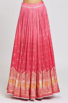 Pink attached cancan ombre lehenga with traditional elephant procession and bandhani print detailing. Paired with sleeveless square neck padded blouse with all over scalloped floral embroidery using sequins, beads, nalki, lace highlights and sequin lace border net dupatta.
Components: 3
Pattern: Embroidery, Print
Type Of Work: Elephant, Floral
Neckline: Square
Sleeve Type: Sleeveless
Fabric: Shaded Textured Net, Upada
Color: Pink
Other Details: 
Attached inner lining
Attached cancan
Padded blous Ombre Lehenga, Traditional Elephant, Print Lehenga, Bandhani Print, Embroidery Print, Padded Blouse, Lehenga Blouse, Pattern Embroidery, Net Dupatta