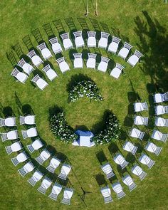 an aerial view of chairs arranged in the shape of a circle