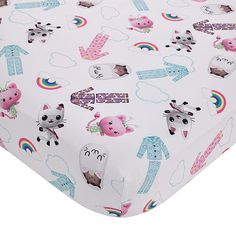 an image of a baby crib sheet with animals and unicorns all over it