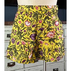 New With Tags Size Xs These Stunning Shorts By Anthropologie In Collaboration With La Fuori Have Intricate Floral Embroidery On A Deep Yellow Background. The High Rise Shorts Have A Modest Cut. The Fabric Is 65% Cotton, 30% Silk, & 5% Metallic Fibers. The Yellow Fabric Is Interwoven With Beautiful Metallic Gold Fibers. They Have A Hidden Side Zipper. *The Shorts Are Not Zipped Up All Of The Way On The Dress Form. The Zipper Is Fully Functional & Works Perfectly. Measurements Laying Flat: Length Spring Yellow Bottoms With Floral Embroidery, Yellow Floral Embroidery Bottoms For Spring, Yellow Floral Print Shorts, Yellow Bottoms With Floral Embroidery For Summer, Yellow Floral Embroidered Bottoms For Summer, Yellow Floral Embroidery Bottoms For Summer, Fitted Cotton Shorts With Floral Print, Fitted Floral Print Cotton Shorts, Fitted Cotton Shorts With Floral Embroidery