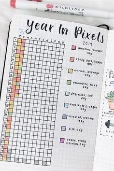 Best Bullet Journal Year at a Glance Ideas for 2024 - Crazy Laura Bullet Journal Year, Journal Year, Bullet Journal Calendrier, Bullet Journal Yearly, Year In Pixels, Goals Bullet Journal