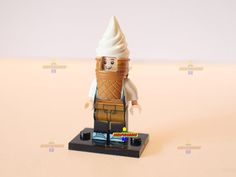 an ice cream cone is in the shape of a lego figure