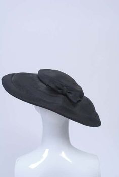 For Sale on 1stDibs - Mr. John, one of America's great milliners, was known for his classic, unembellished shapes, working under his own label from the late 1940s until 1970. Classic Hats For Church And Royal Ascot, Fitted Boater Hat With Short Brim For Evening, Fitted Top Hat With Curved Brim For Evening, Fitted Top Hat With Flat Brim For Evening, Fitted Evening Hat With Short Brim, Vintage Black Boater Hat With Curved Brim, Black Boater Hat With Curved Brim For Church, Black Curved Brim Boater Hat For Church, Black Boater Hat With Curved Brim For Evening