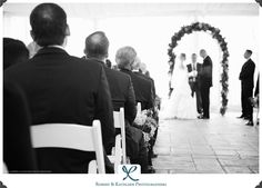 the bride and groom are walking down the aisle