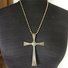 "HUGE ZUNI CROSS PENDANT with STERLING SILVER CHAIN DESCRIPTION: This impressive old Zuni cross pendant, paired with a sterling silver chain from Michele Baratta (Anglo) will be a lovely addition to your collection of fine vintage Native American jewelry. MEASUREMENTS: Pendant measures 4\" x 2 3/4\" Shepherd's hook Chain measures 24\" WEIGHT: Pendant weighs 36.7 grams Chain weighs 34.7 grams Total weight: 71.4 grams SIGNED: Cross is unsigned STERLING: Cross is unsigned, verified sterling" Jewelry Measurements, Vintage Native American Jewelry, Turquoise Bracelet Cuff, Squash Blossom Necklace, Turquoise Cuff, Vintage Navajo, Gorgeous Bracelet, Coral Turquoise, Denver Co