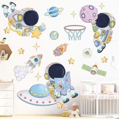 a child's room with space themed wall decals