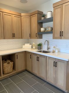 the kitchen is clean and ready to be used for cooking or cleaning up some dishes