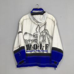 "Vintage 90s Phenix Wolf Winter Anorak Bomber Jacket XLarge Phenix Cordura Ski Wear Jacket Multicolor Snowboard Skiing Hooded Jacket Coat Size M Please contact me for any questions about this clothing before buying. Size on tag : None but fits like Size XL (check measurements below) Measurement : Armpit to armpit : 27\" inches Back collar to hem (total length) : 30\" inches Weight : 0.95 kg Condition : Minor stain, please refer photos. Delivery / Postage :- DHL EXPRESS / EXPEDITED = 3-5 business Hooded Graphic Print Windbreaker For Streetwear, Winter Hooded Windbreaker With Graphic Print, Hooded Windbreaker With Graphic Print For Sports, Hooded Graphic Print Windbreaker For Sports, 90s Windbreaker For Outdoor Activities, 90s Style Windbreaker For Outdoor Activities, Long Sleeve Windbreaker With Graphic Print For Outdoor, Snowboarding Windbreaker With Pockets, Long Sleeve Windbreaker With Pockets For Snowboarding