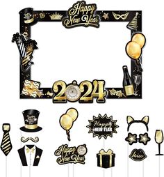 new year's eve photo booth props with balloons, hats, and streamers