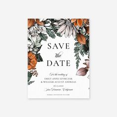 save the date card with an orange and white floral design on it, in front of a