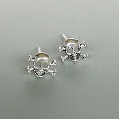 A PAIR of tiny sterling silver tiny dog ear studs. Dimensions: 7 x 6 mm Price listed is for a PAIR of earrings. These earrings are made of 925 hypoallergenic sterling silver. Comes with 925 marked silver butterfly backs. Can be packaged in a gift box. I can include a personal message from you if needed You are welcome to contact me at... bhavnakwintra1956@gmail.com For more beautiful pieces from my shop, please browse 👇 TOE RINGS: https://www.etsy.com/your/shops/TheSilverGame/tools/listings/sec Tiny Dog, Evil Eye Earrings, Thread Earrings, Dog Ear, Ear Stud, Silver Butterfly, Cross Earrings, Bohemian Earrings, Religious Jewelry