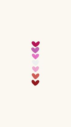 three hearts are arranged in the shape of a long arrow on a white background with red, pink and purple colors