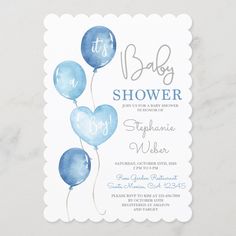 a baby shower is shown with blue balloons