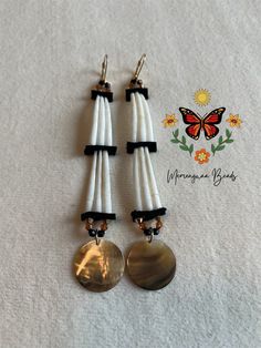 Made with Dentalium shells, black Alaska split leather, various 4mm bicones, 1 inch black lip shells and are on 18kt plated gold lever hooks. They hang approx 6 inches long.  Indigenous made on treaty 1 land. Dentalium Shell Earrings, Dentalium Earrings, Native American Beadwork Earrings, American Indian Decor, Indigenous Jewelry, Native American Hair, California Jewelry, Seed Bead Jewelry Patterns, Ribbon Skirt