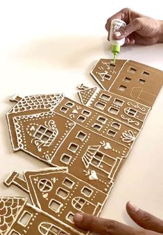 25 Best cardboard Christmas decorations & crafts ideas such as easy DIY Xmas trees, ornaments, wreaths, fireplace, gingerbread houses, winter village, snowman, etc! - A Piece of Rainbow, holiday crafts for kids, advent calendar, garland, handmade, gifts, gift tags, modern, farmhouse, boho, Scandinavian, vintage, budget decor, dollar store, Anthropologie style, wall decor Gingerbread Christmas Village, Poster Natal, Diy Gingerbread, Appetizers Christmas, Desserts Christmas, Cardboard Cartons, Gingerbread Diy, Gingerbread Christmas